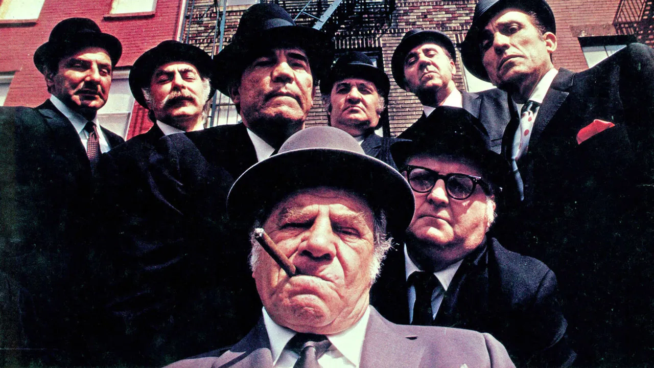 The Gang That Couldn't Shoot Straight backdrop