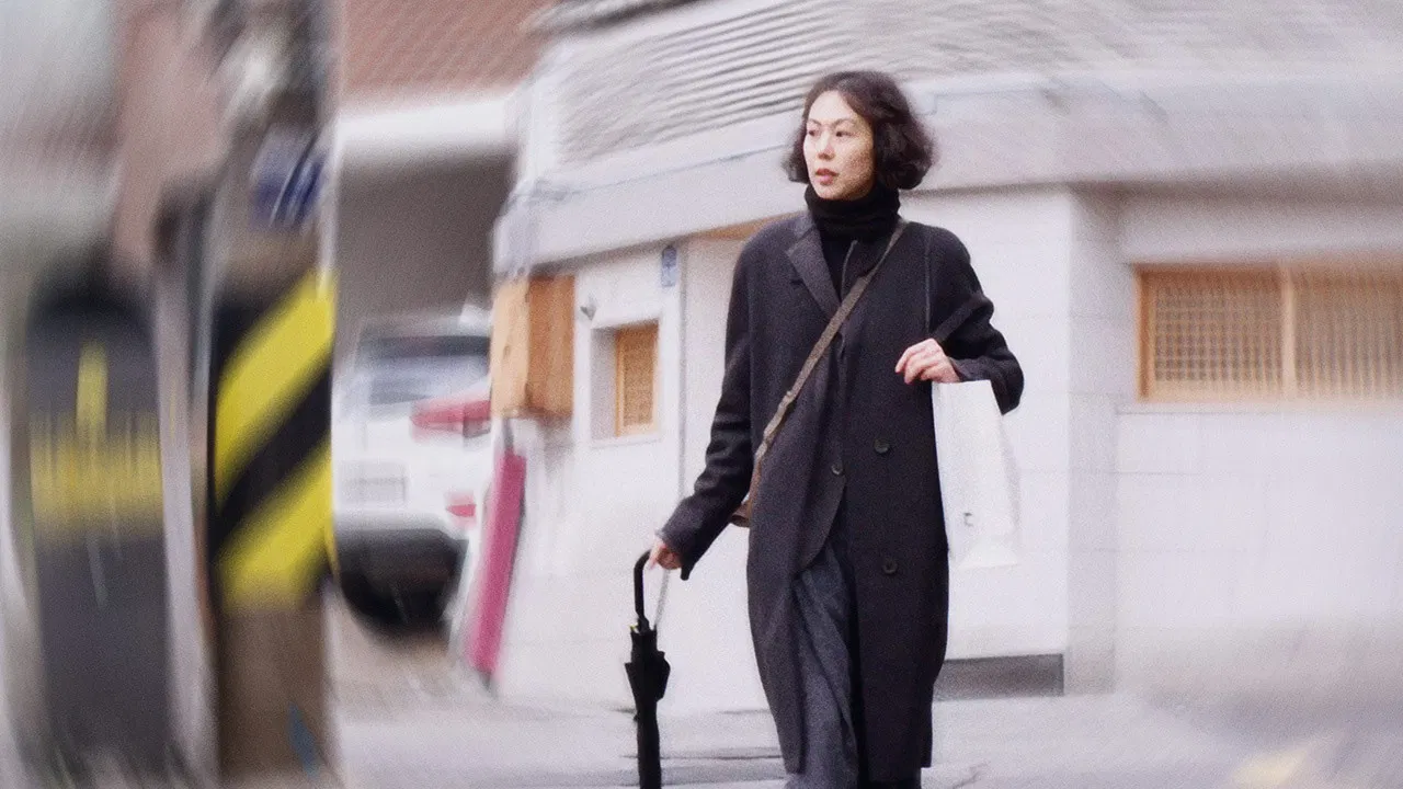 The Woman Who Ran backdrop