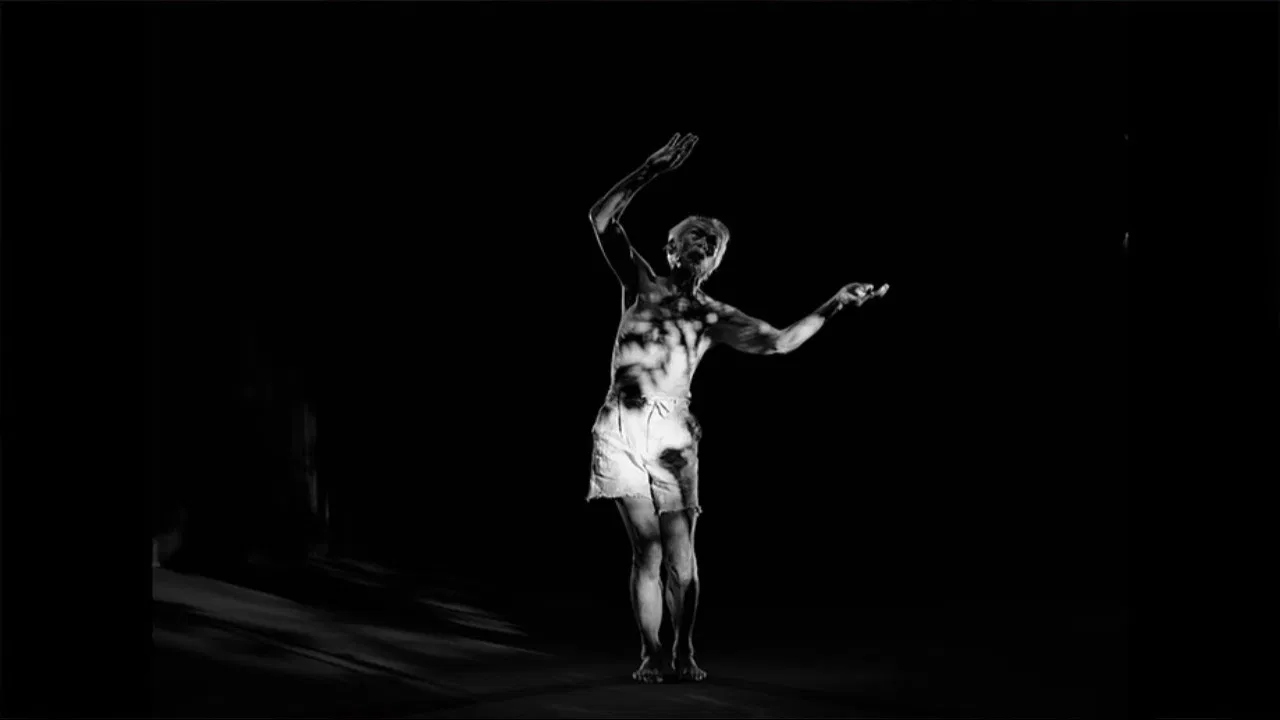 some body comes into the light backdrop