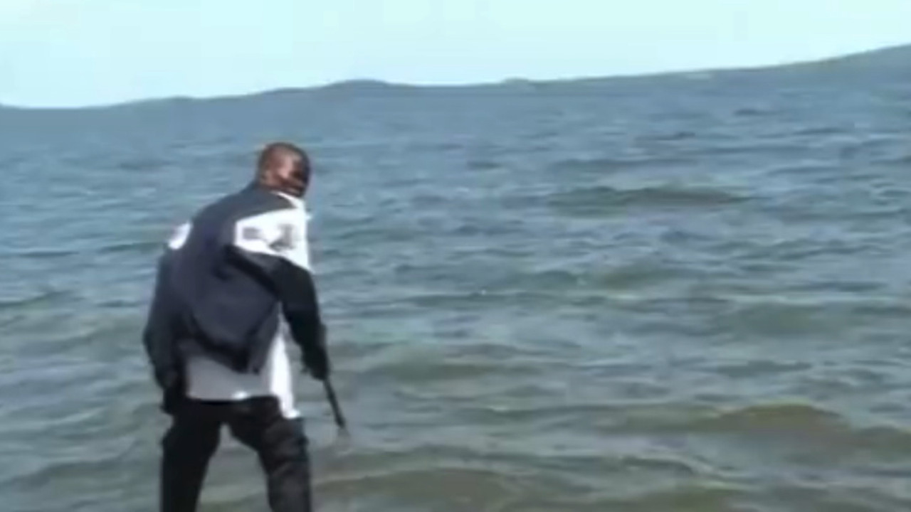 Who Killed Captain Alex? backdrop