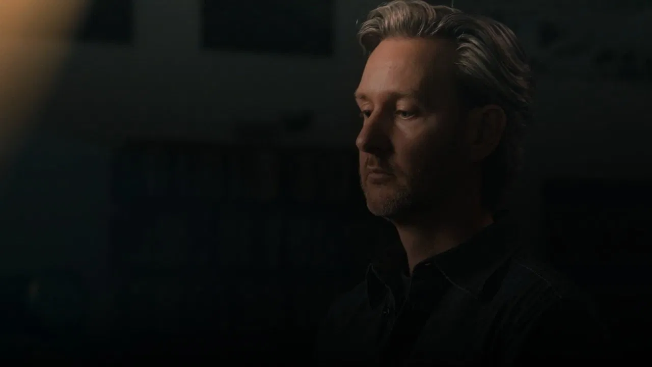 A Cursed Man backdrop