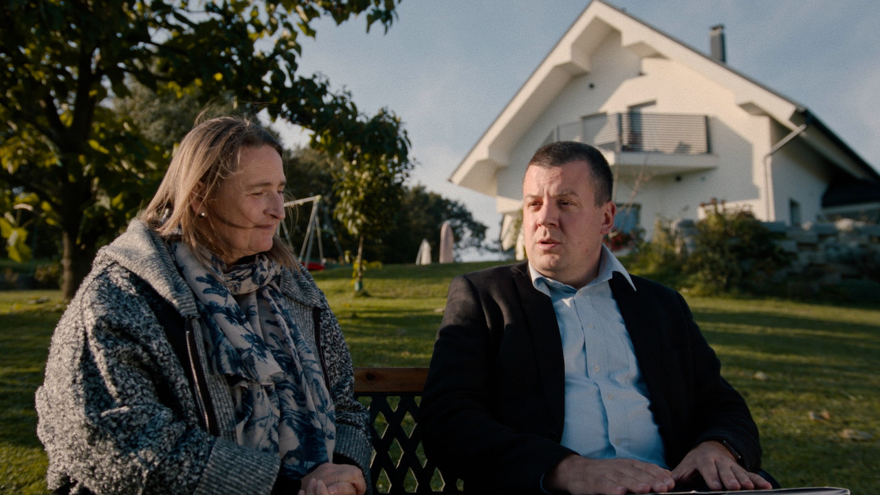 A White Warrior in a Black Suit backdrop