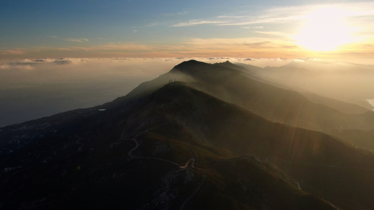 The Charcoal Makers of Ikaria Island backdrop