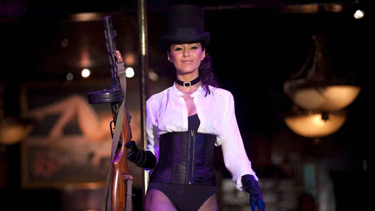 Girl Walks Into a Bar backdrop