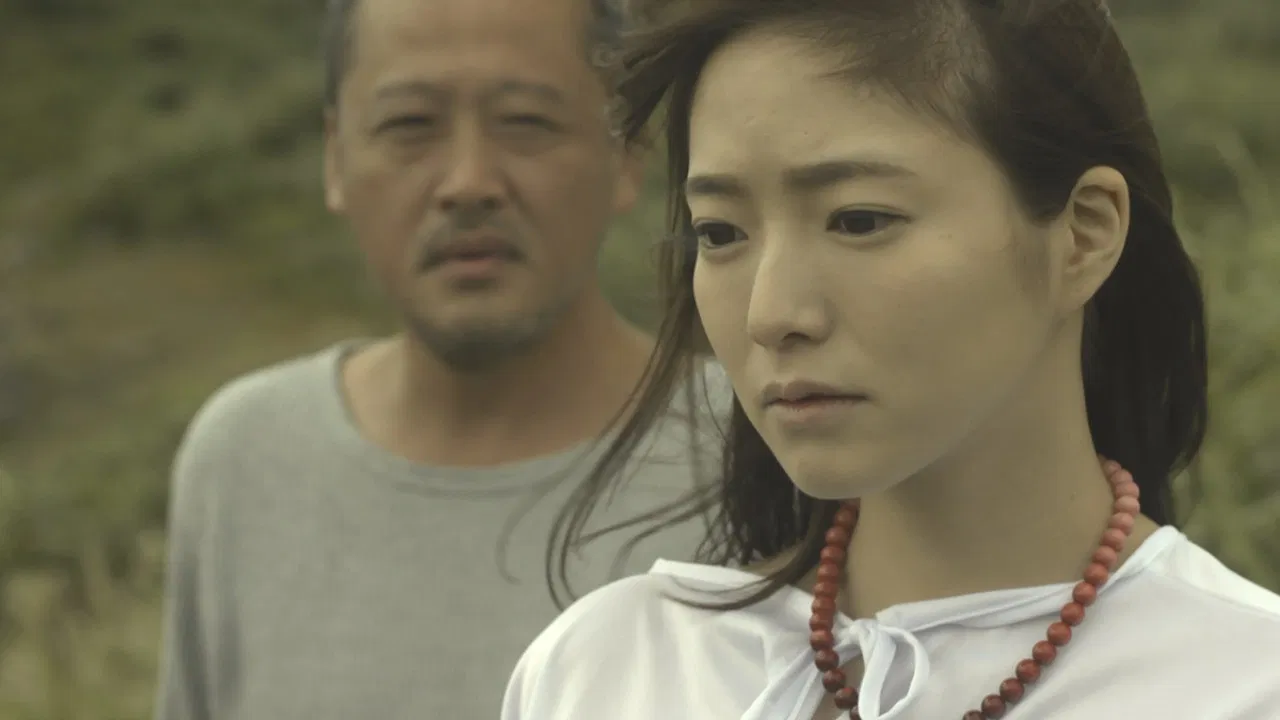 The Beach of Reunion: The Woman Who Slept with Regret backdrop