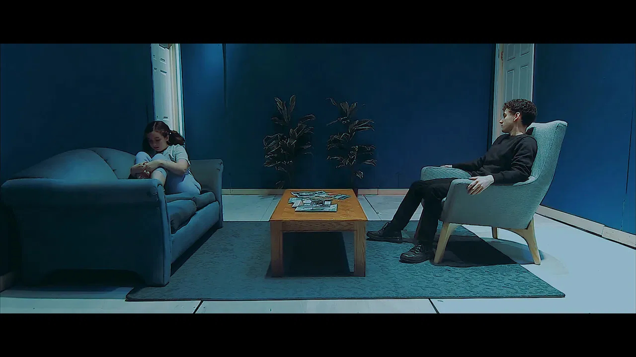 The Con Artist backdrop