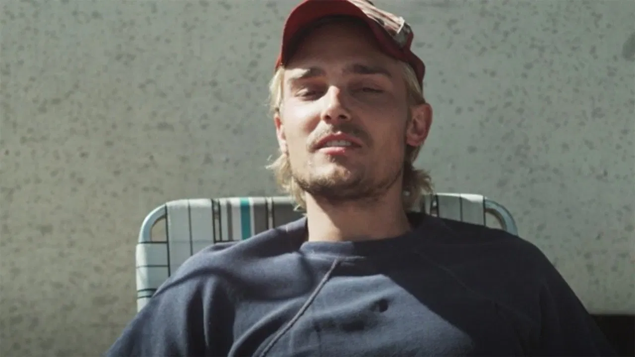 Screwball: The Ted Whitfield Story backdrop