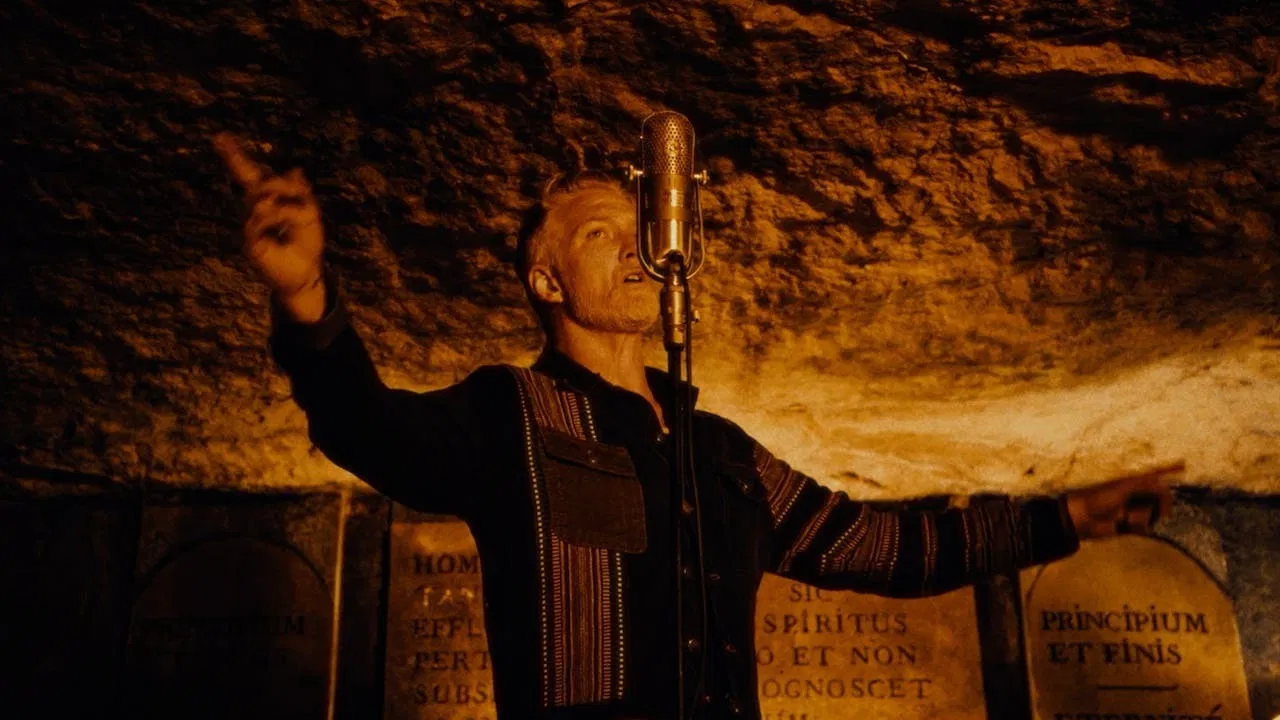 Queens of the Stone Age: Alive in the Catacombs backdrop