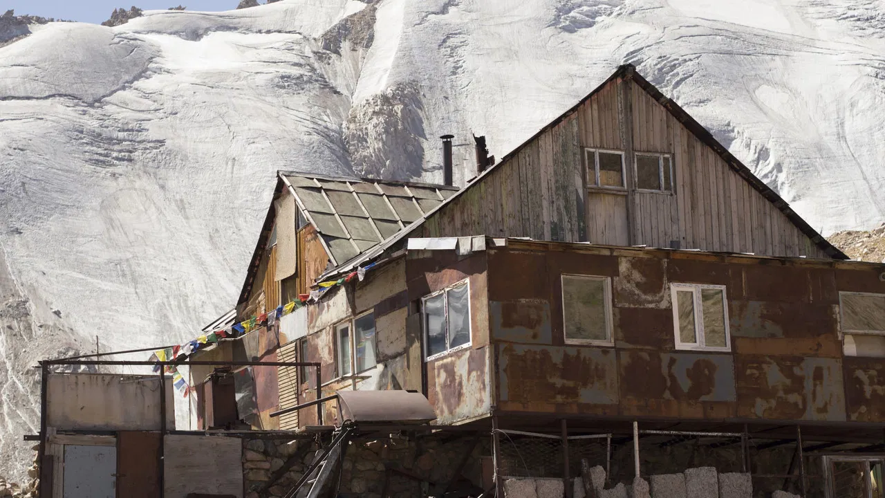Woman and the Glacier backdrop