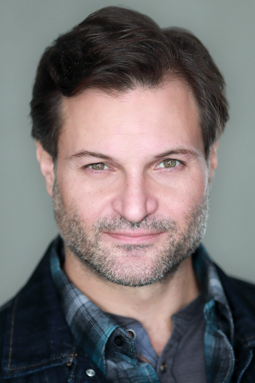 Justin Adams profile