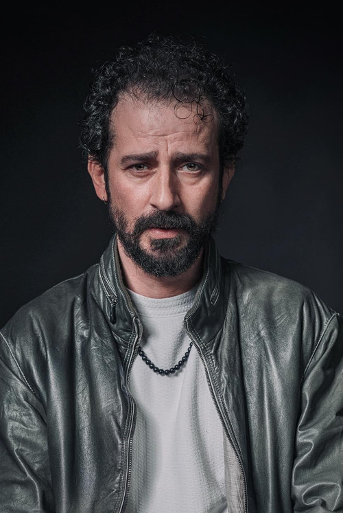 Özay Özgüler profile