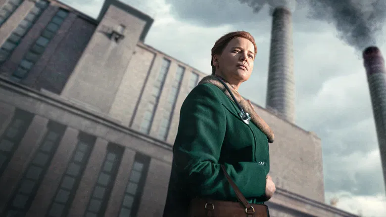 Joanna Kulig as Dr. Jolanta Wadowska-Król navigating the industrial landscape