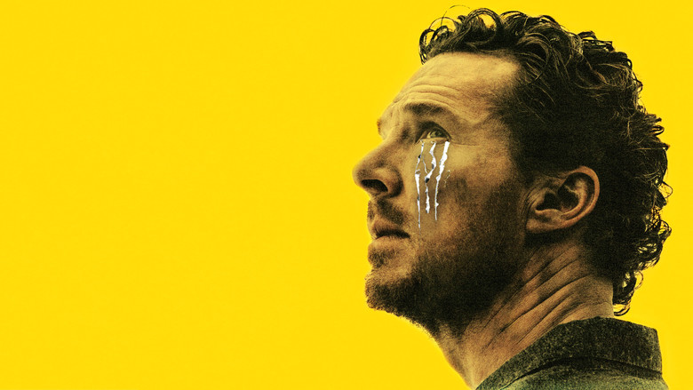 Benedict Cumberbatch as Dad sitting in a dim room