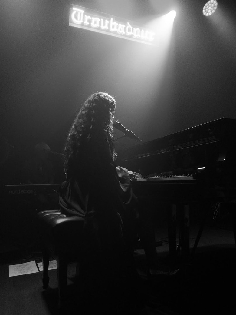 Laufey - Live at The Troubadour poster background
