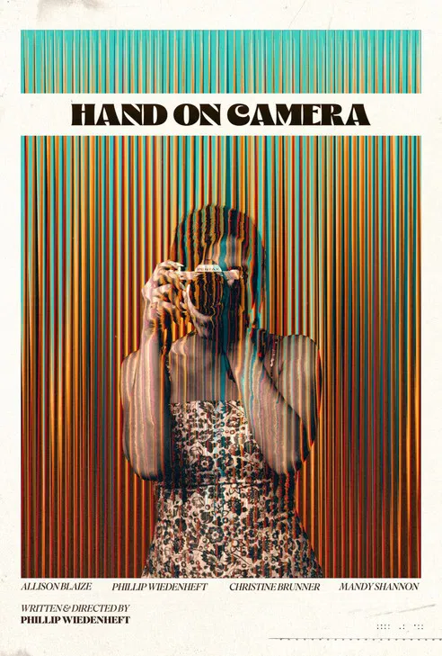 Hand On Camera poster background