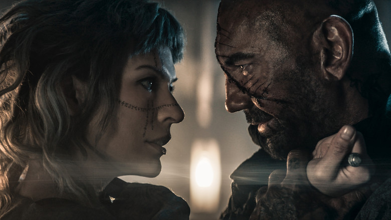 The sorceress Gray Alys stands amidst the digital ruins