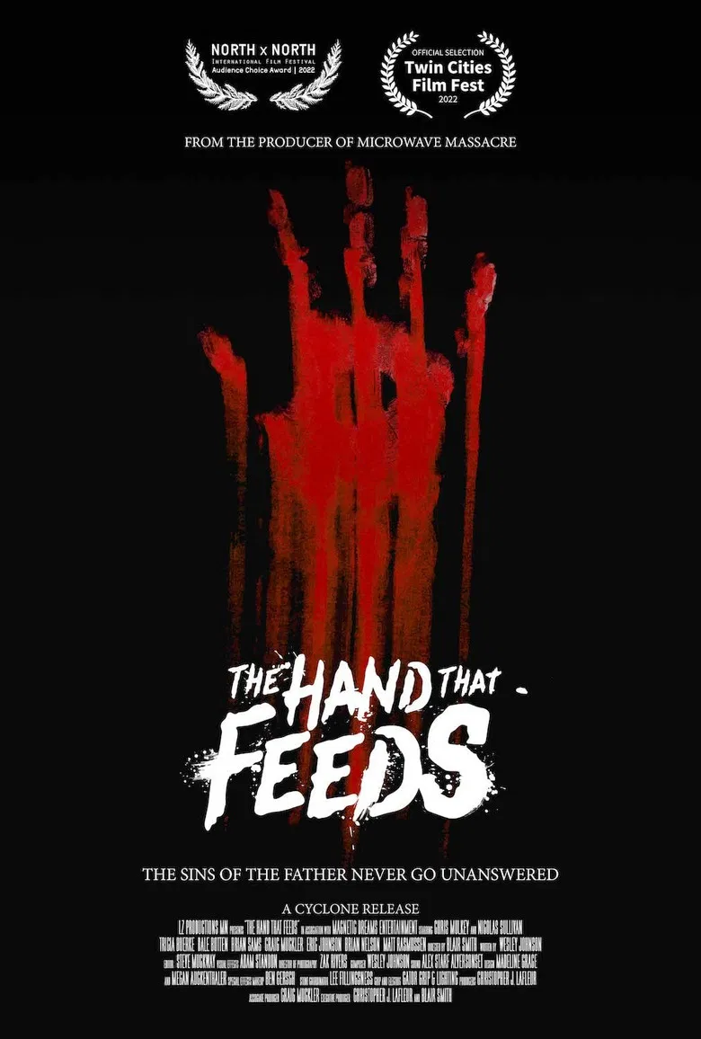 The Hand That Feeds poster background