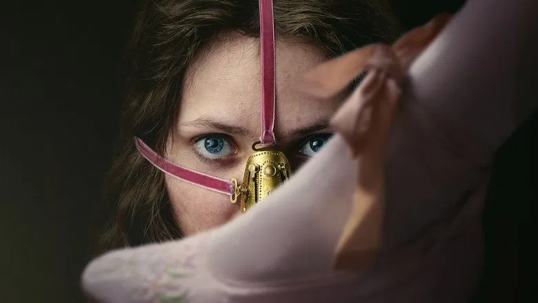 Elvira looking in the mirror, distraught