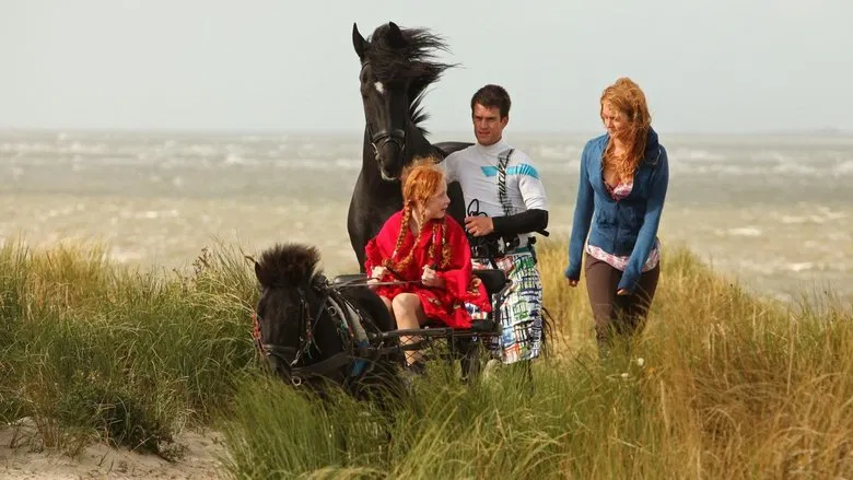 Lisa bonding with the horse on the beach