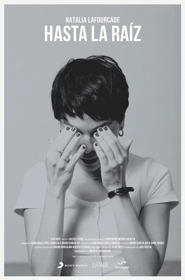 Hasta la raíz poster background
