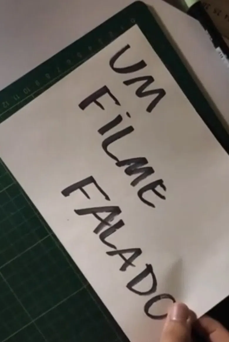 Um Filme Falado poster background
