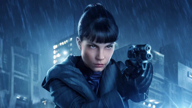 Officer K stands in the rain looking up